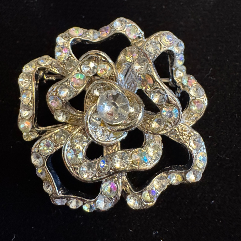 Vintage silver tone and sparkling crystal ribbon rose brooch